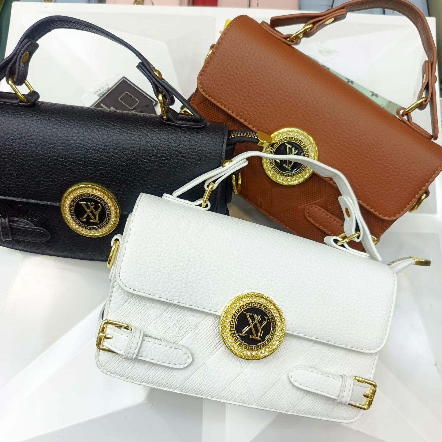 Elegant Monogram Top-Handle Bag with Gold Accent